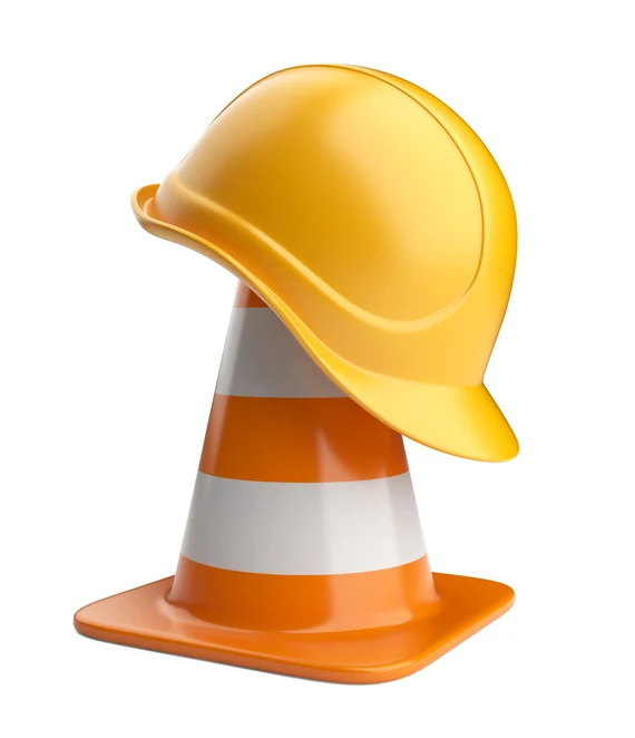 Warnkegel mit Bauhelm oben drauf